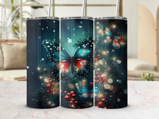 Three tumblers featuring a vibrant butterfly design against a dark, bokeh background.