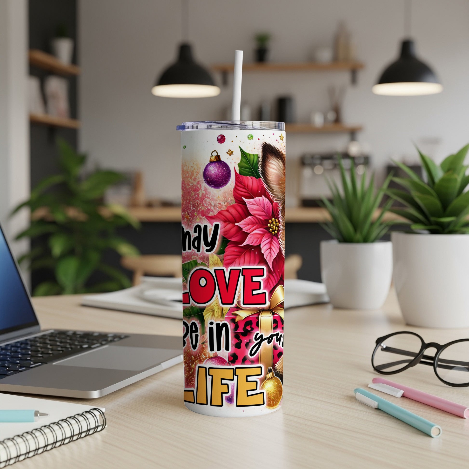 Christmas tumbler with festive poinsettias, leopard print, and "May love be in your life" text.