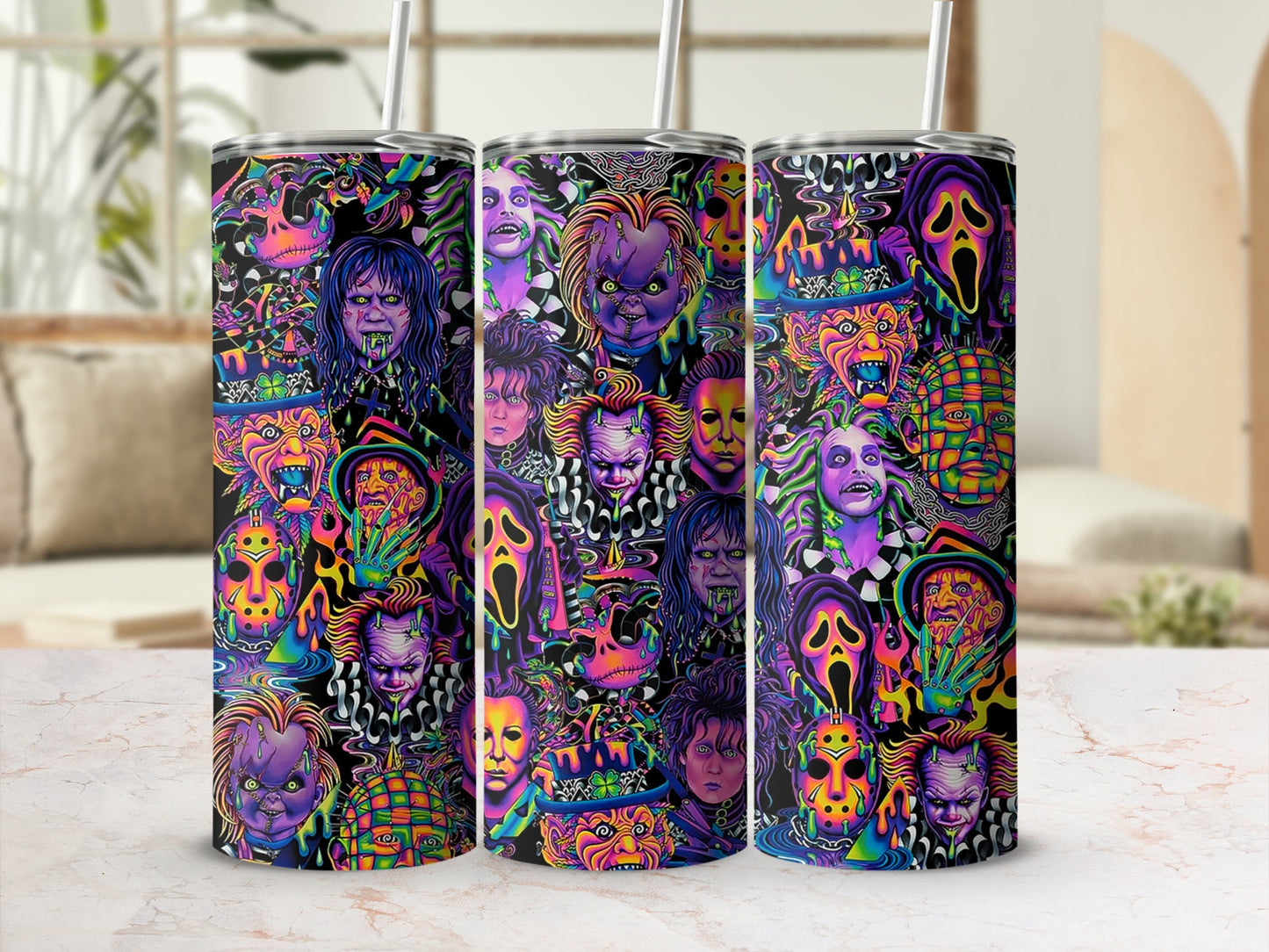 Tumbler with colorful collage of horror movie characters including Chucky and Ghostface.