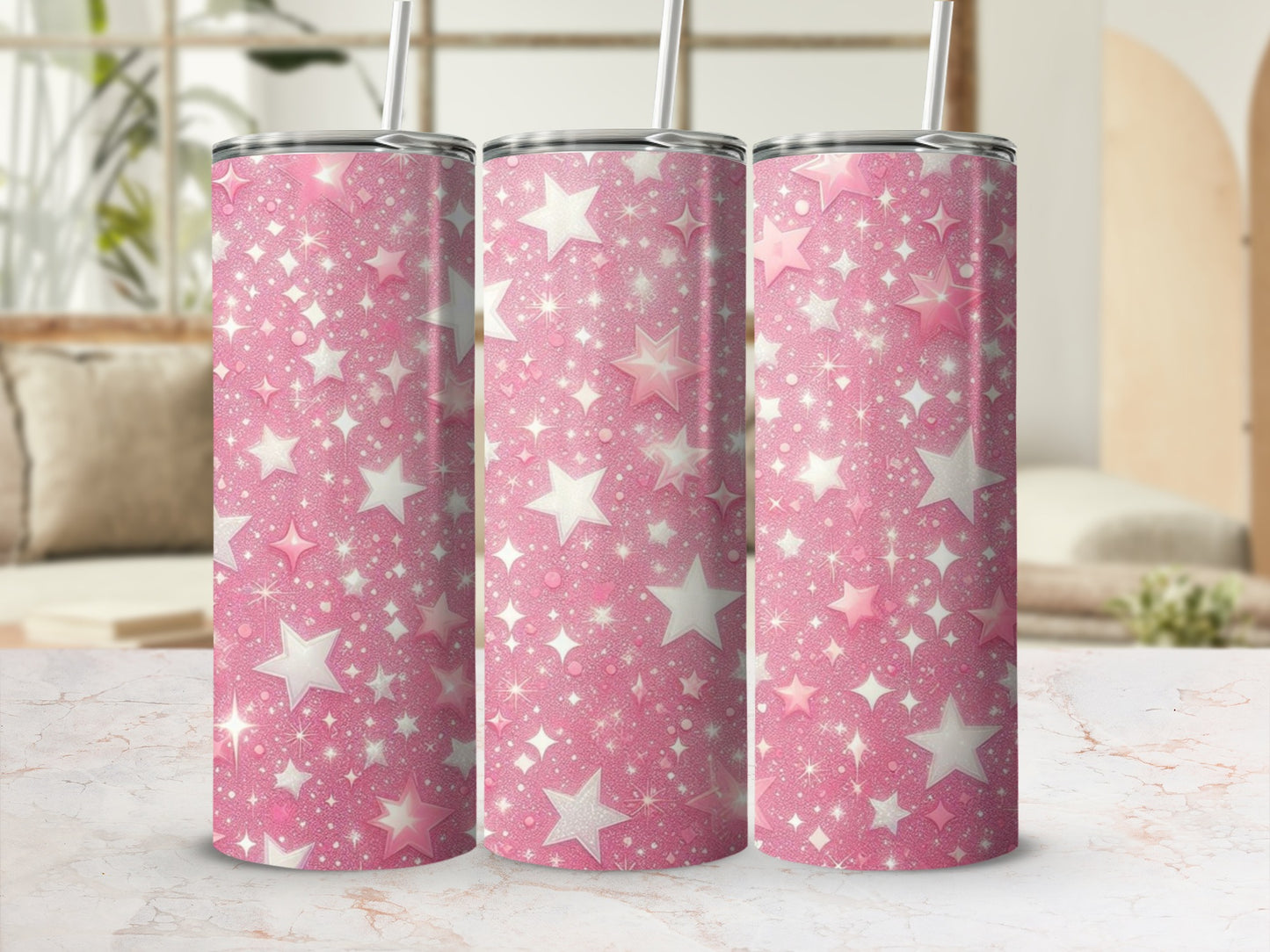Pink tumbler with scattered glittery stars and sparkles.
