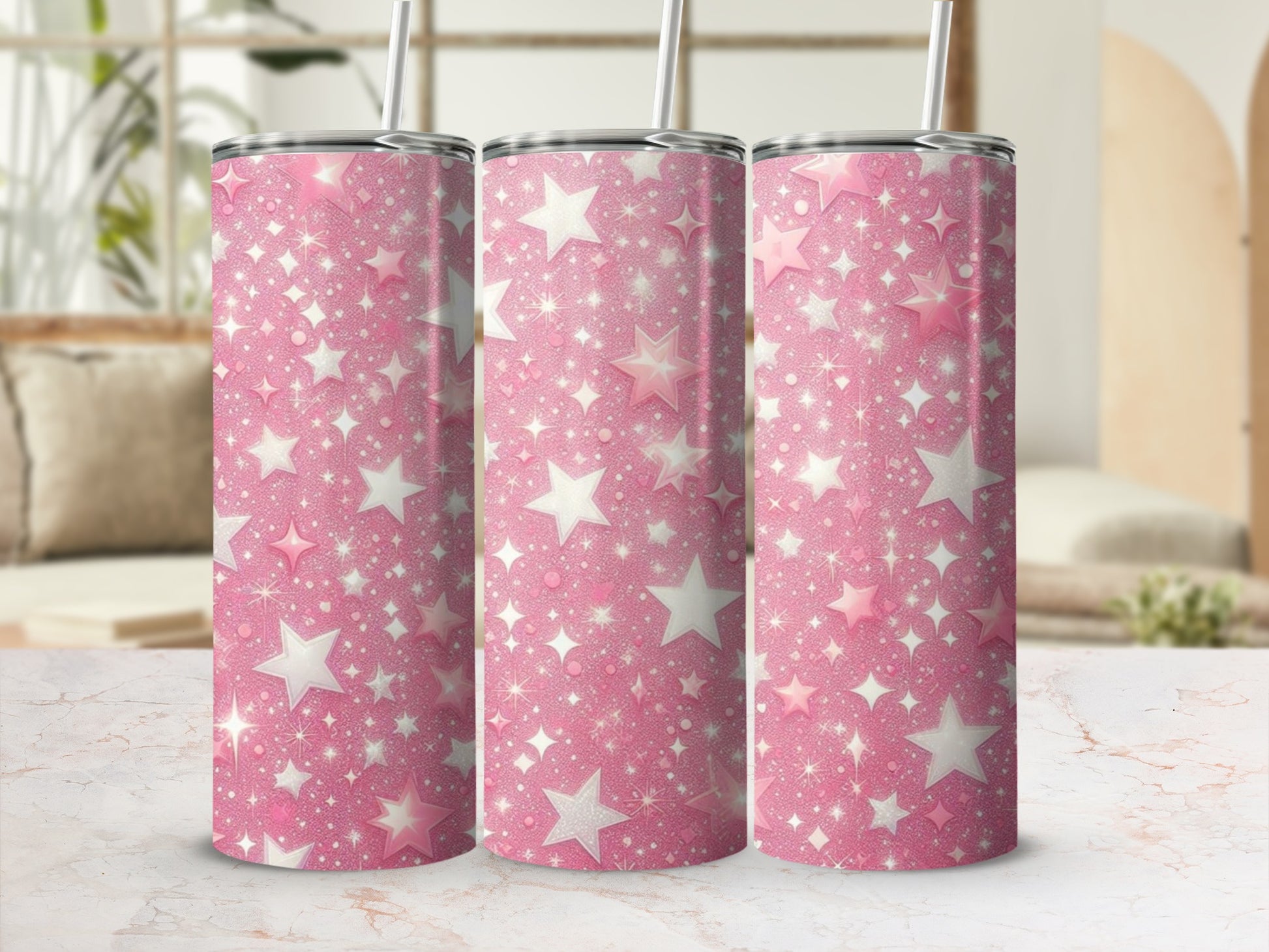 Pink tumbler with scattered glittery stars and sparkles.