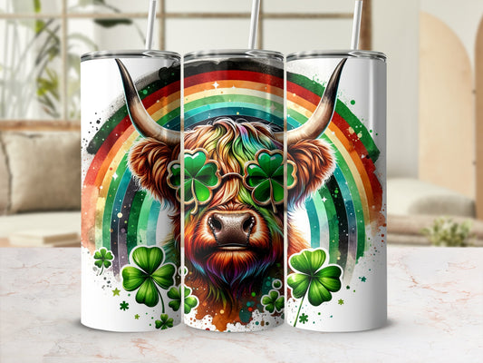 Highland cow wearing clover sunglasses with a rainbow background.