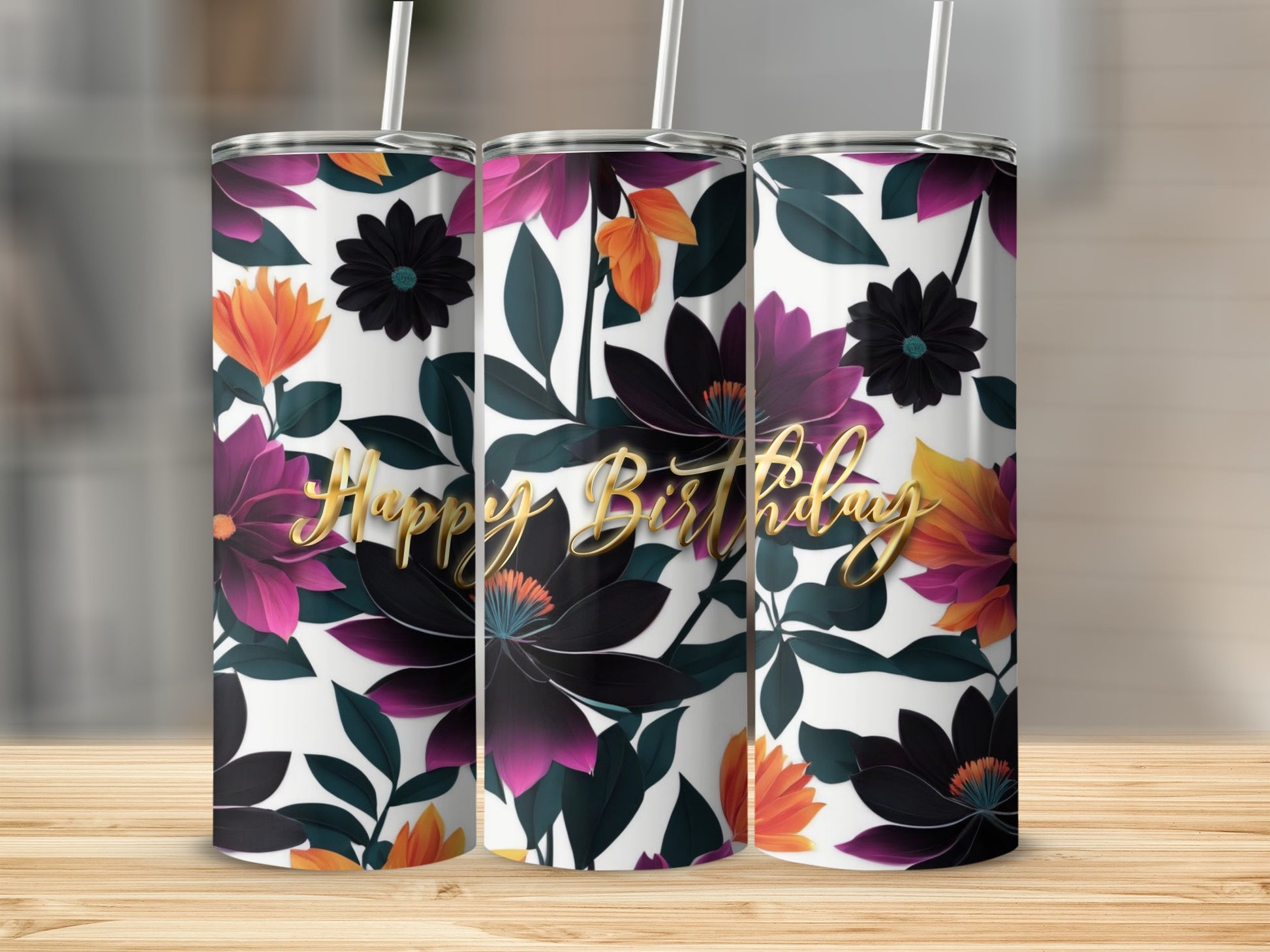 Three tumblers with a floral design and "Happy Birthday" text.