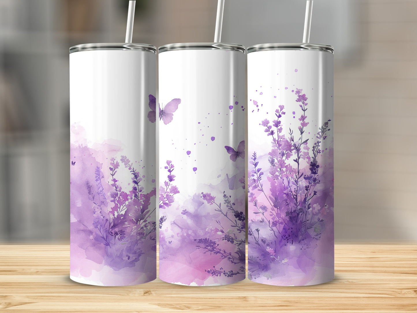 Three tumblers with purple watercolor lavender and butterfly designs.