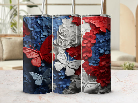 Red, white, and blue butterflies and flowers adorn a trio of tumblers.