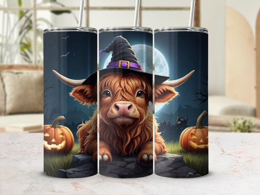 Highland cow wearing a witch hat and surrounded by pumpkins and a moonlit Halloween scene.