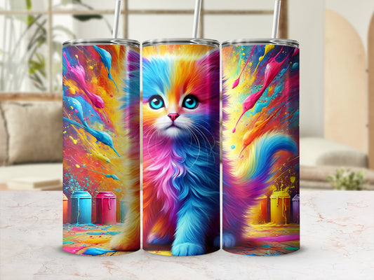 Rainbow watercolor kitten on a colorful splatter background with two tumblers.