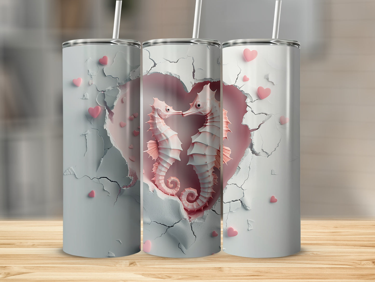 Three tumblers with a seahorse couple design and heart accents.