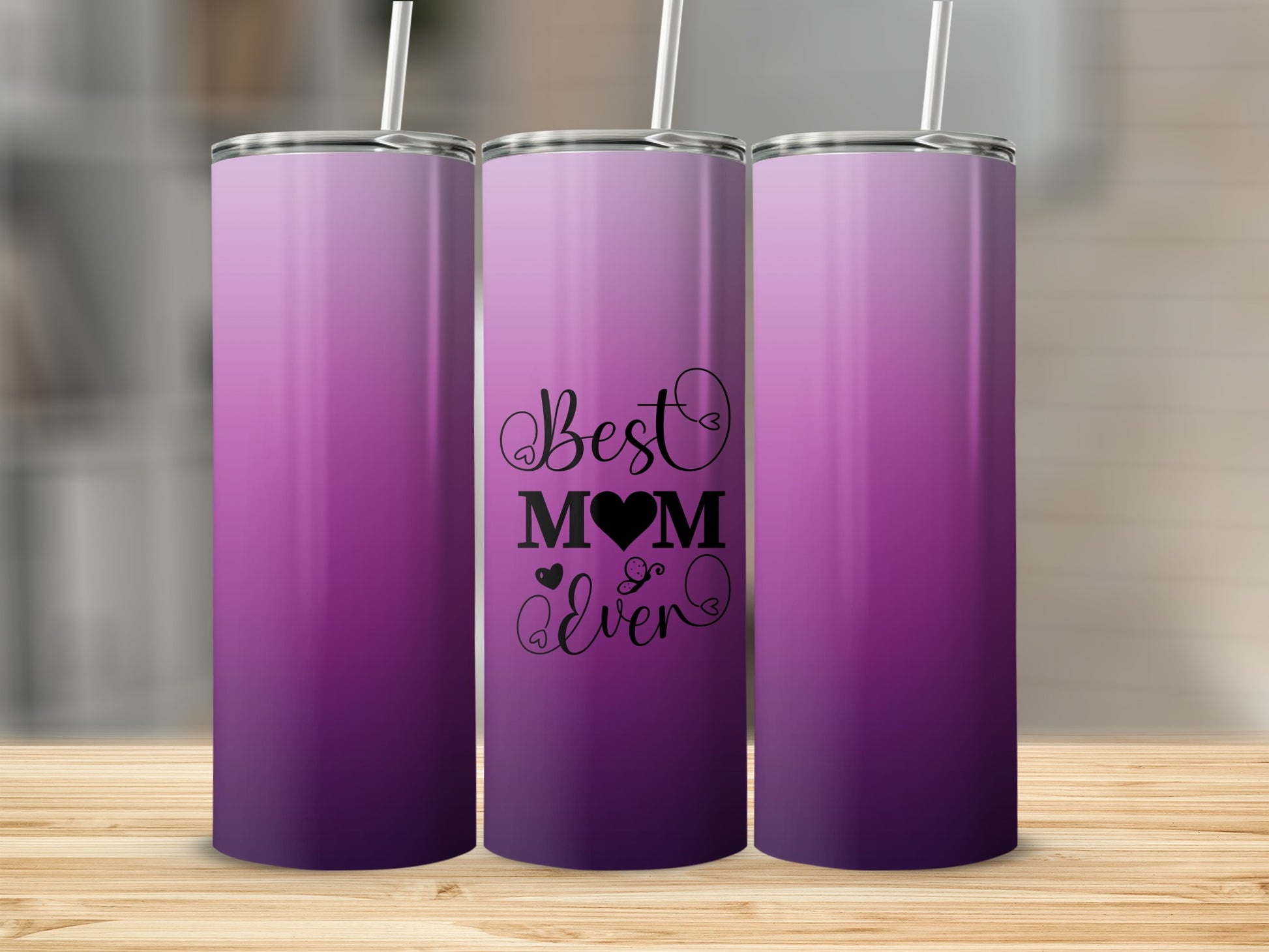 Purple ombre tumbler with "Best Mom Ever" text and heart graphic.