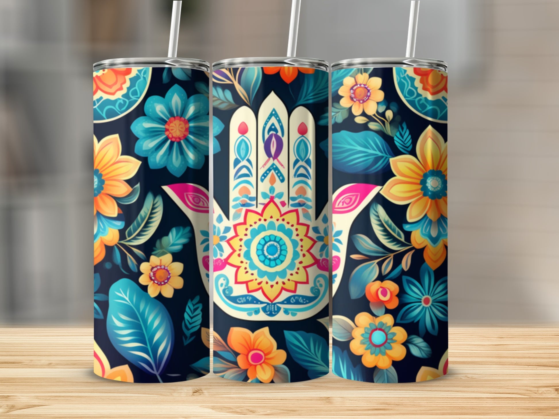 Three tumblers with a colorful floral Hamsa hand design on a dark background.