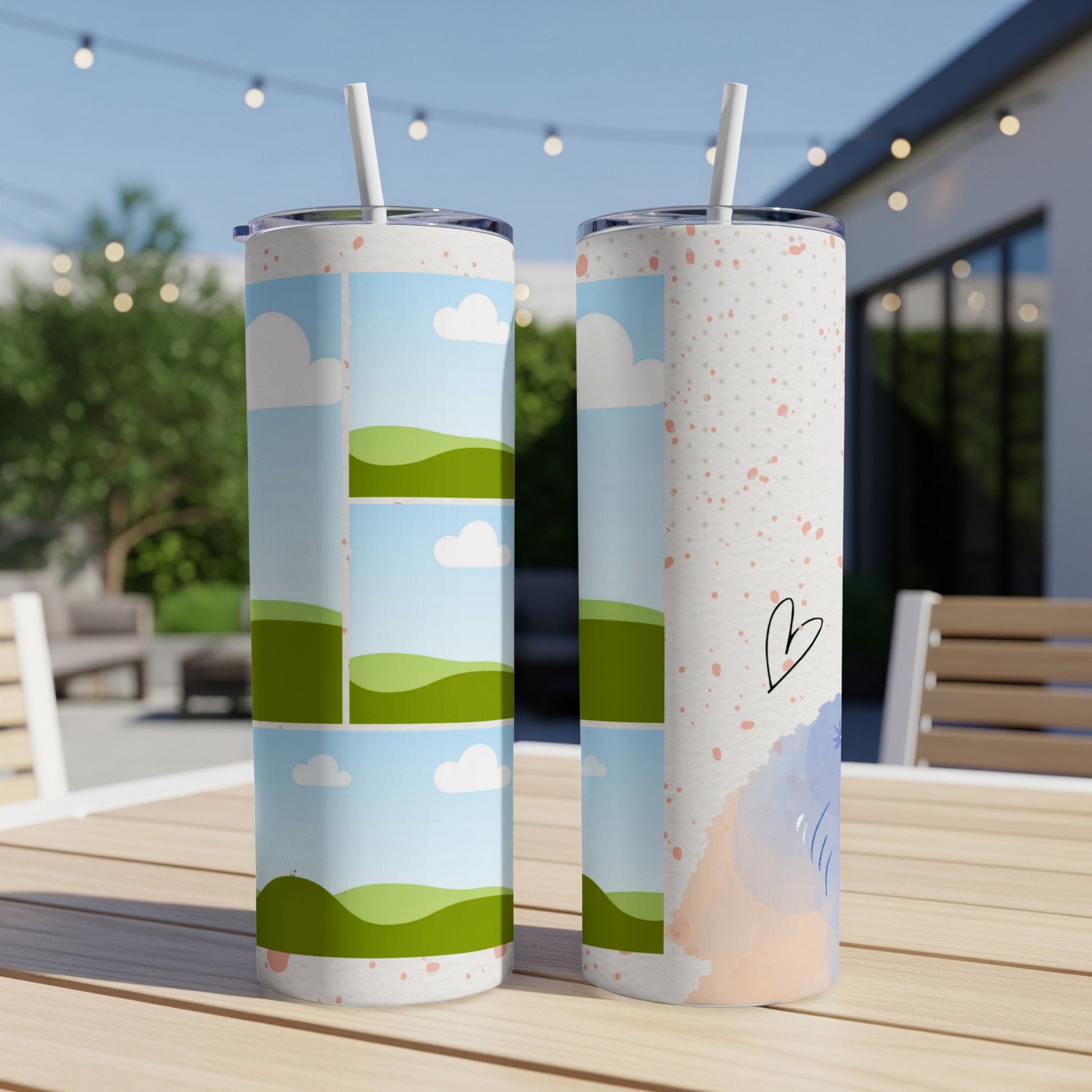 Two tumblers with sky and rolling hills design, one with scattered dots.