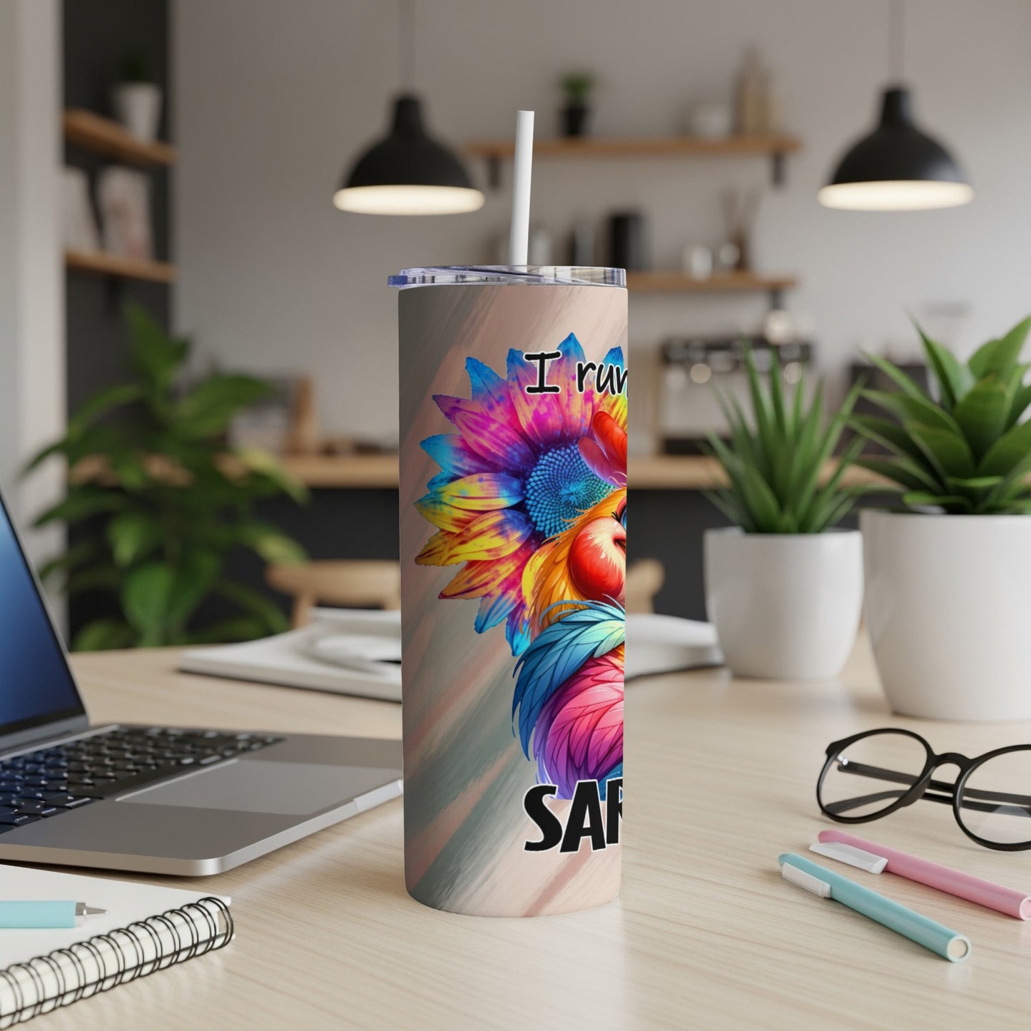 Tumbler with colorful sunflower, apple, and text.