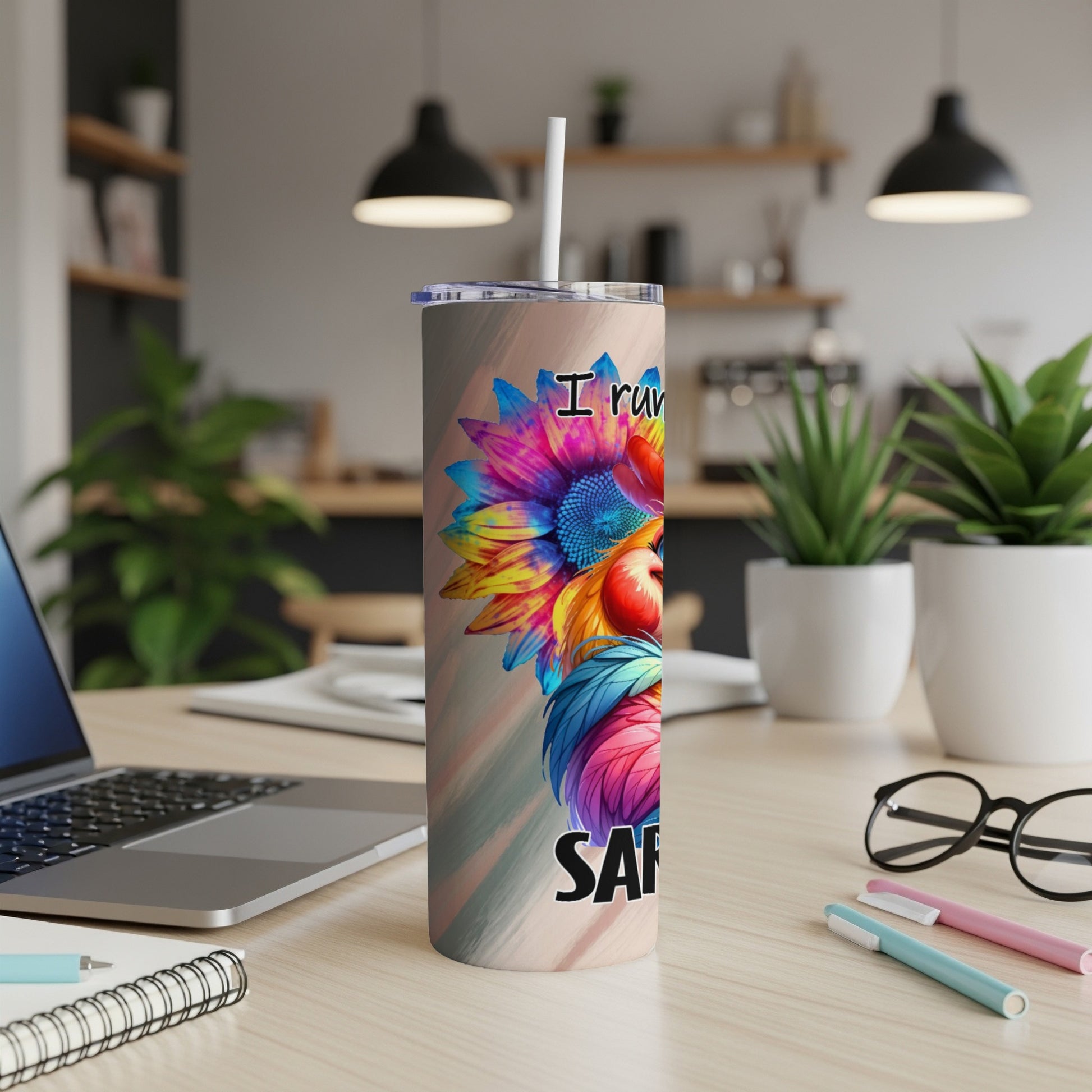 Tumbler with colorful sunflower, apple, and text.