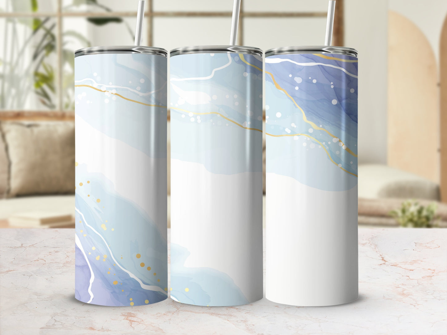 Three tumblers with abstract blue and white watercolor design and gold accents.