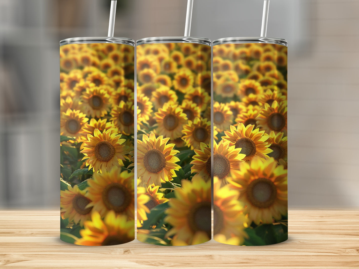 Three tumblers with a close-up, blurred sunflower field design.