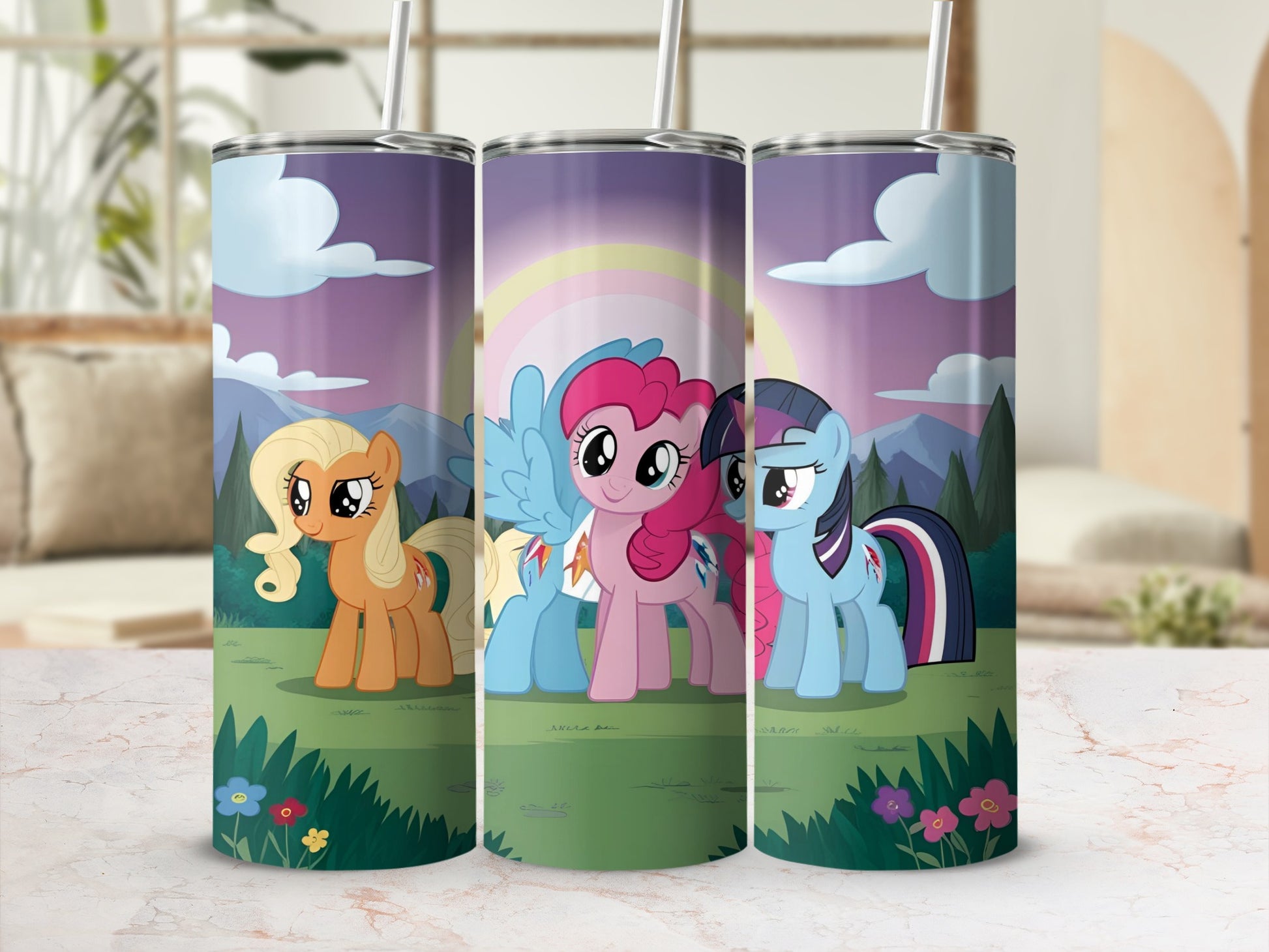 My Little Pony characters Applejack, Pinkie Pie, and Rainbow Dash on a colorful tumbler.