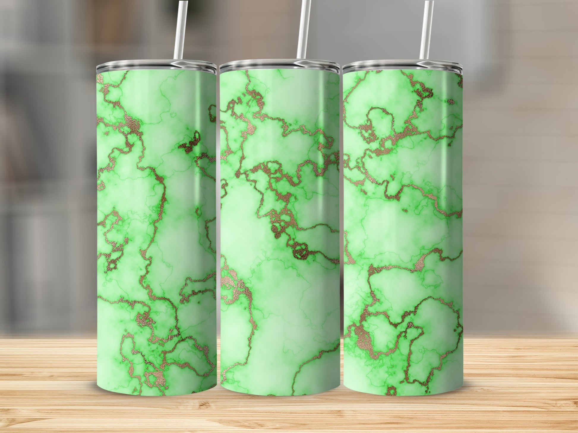 Three tall tumblers with a green marble and gold veining design.