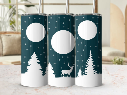 Dark teal tumbler with white snowflakes, trees, and a deer silhouette.