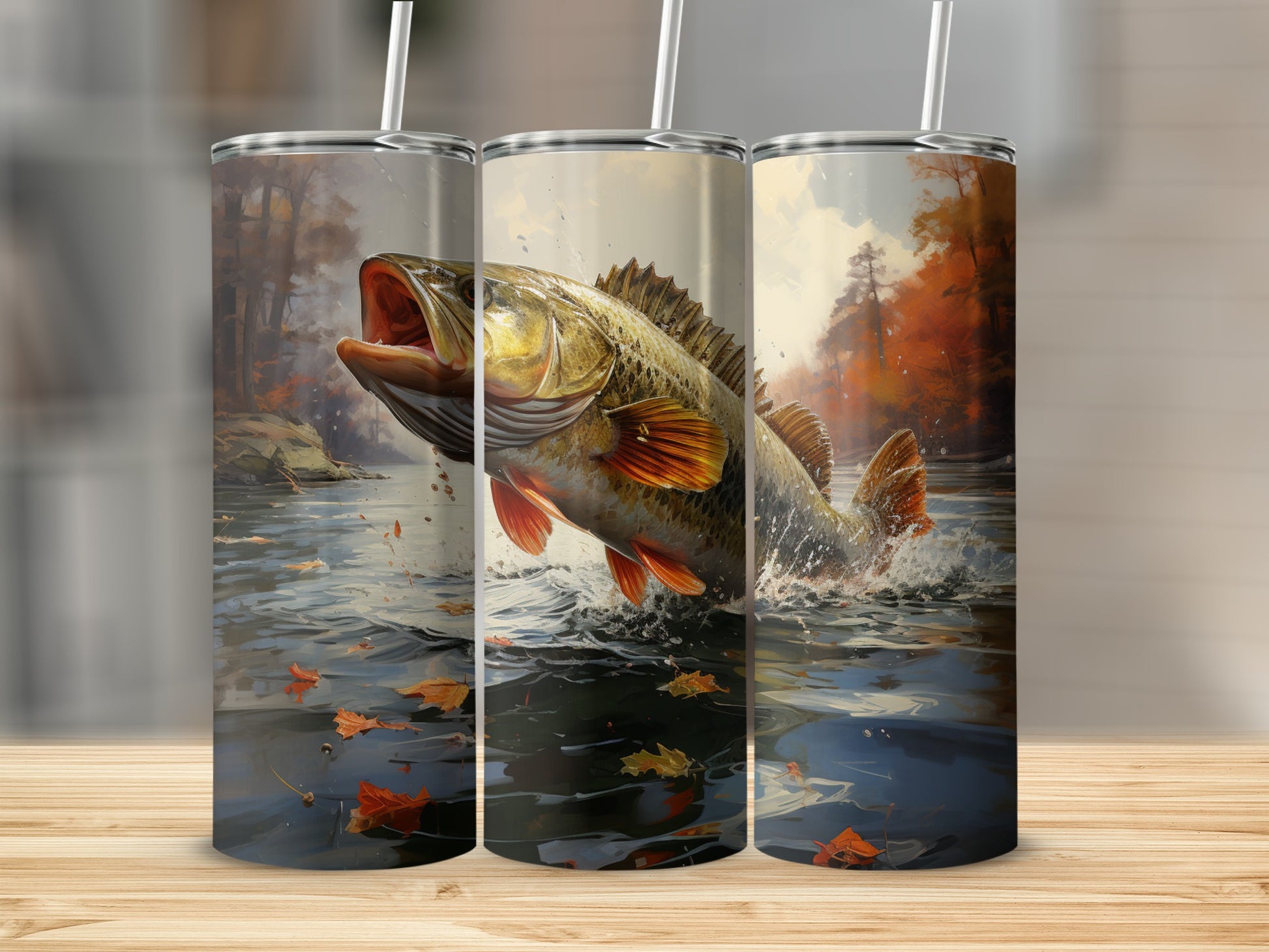 Three tumblers featuring a largemouth bass leaping from water with autumn leaves.