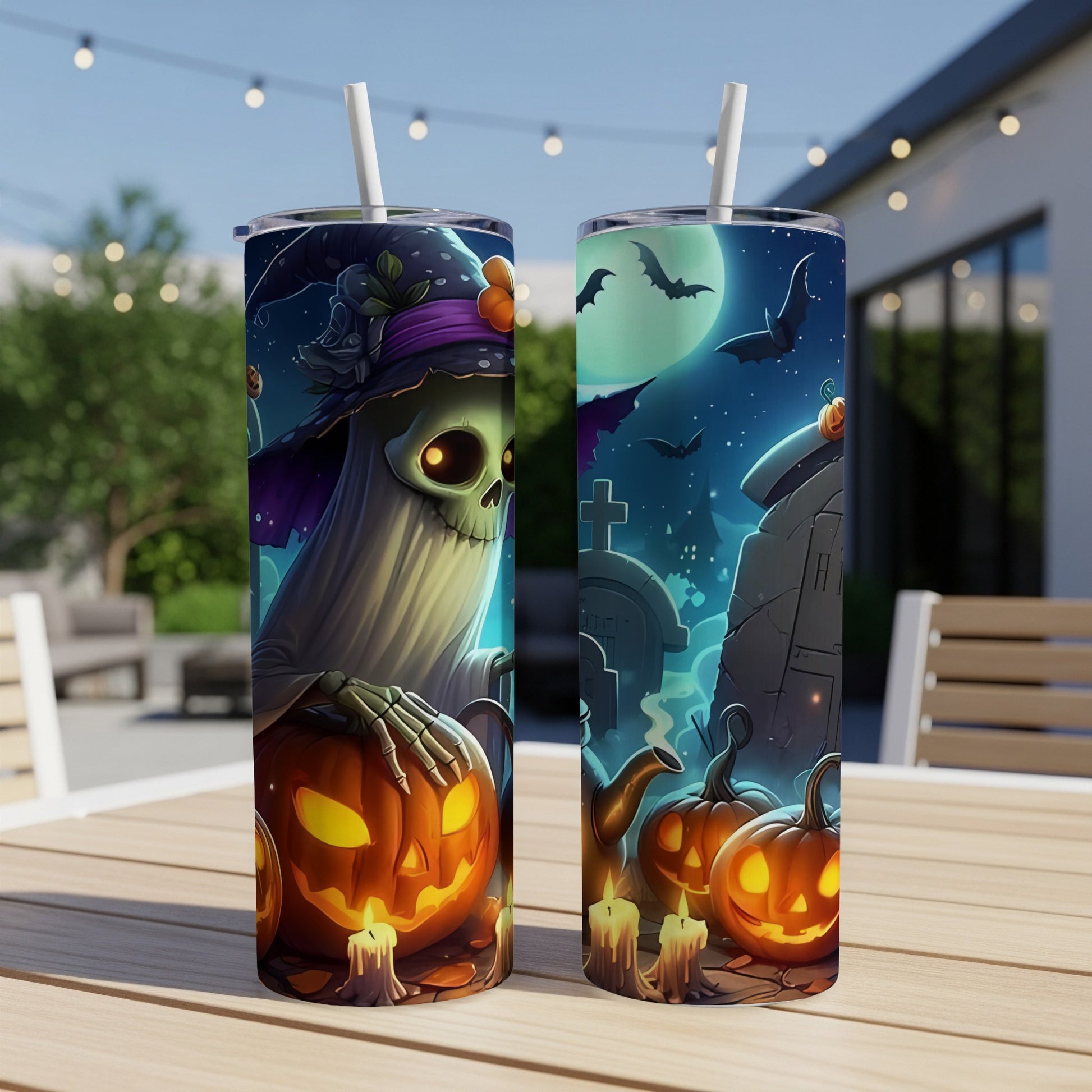Halloween tumblers featuring a ghost, pumpkins, bats, and a spooky graveyard scene.