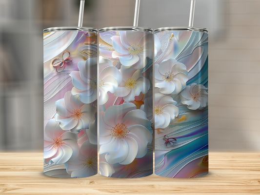 Three tumblers with iridescent floral designs featuring white and pink flowers.