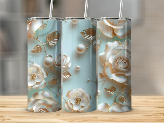 Three tall tumblers with a light blue background and embossed gold roses.