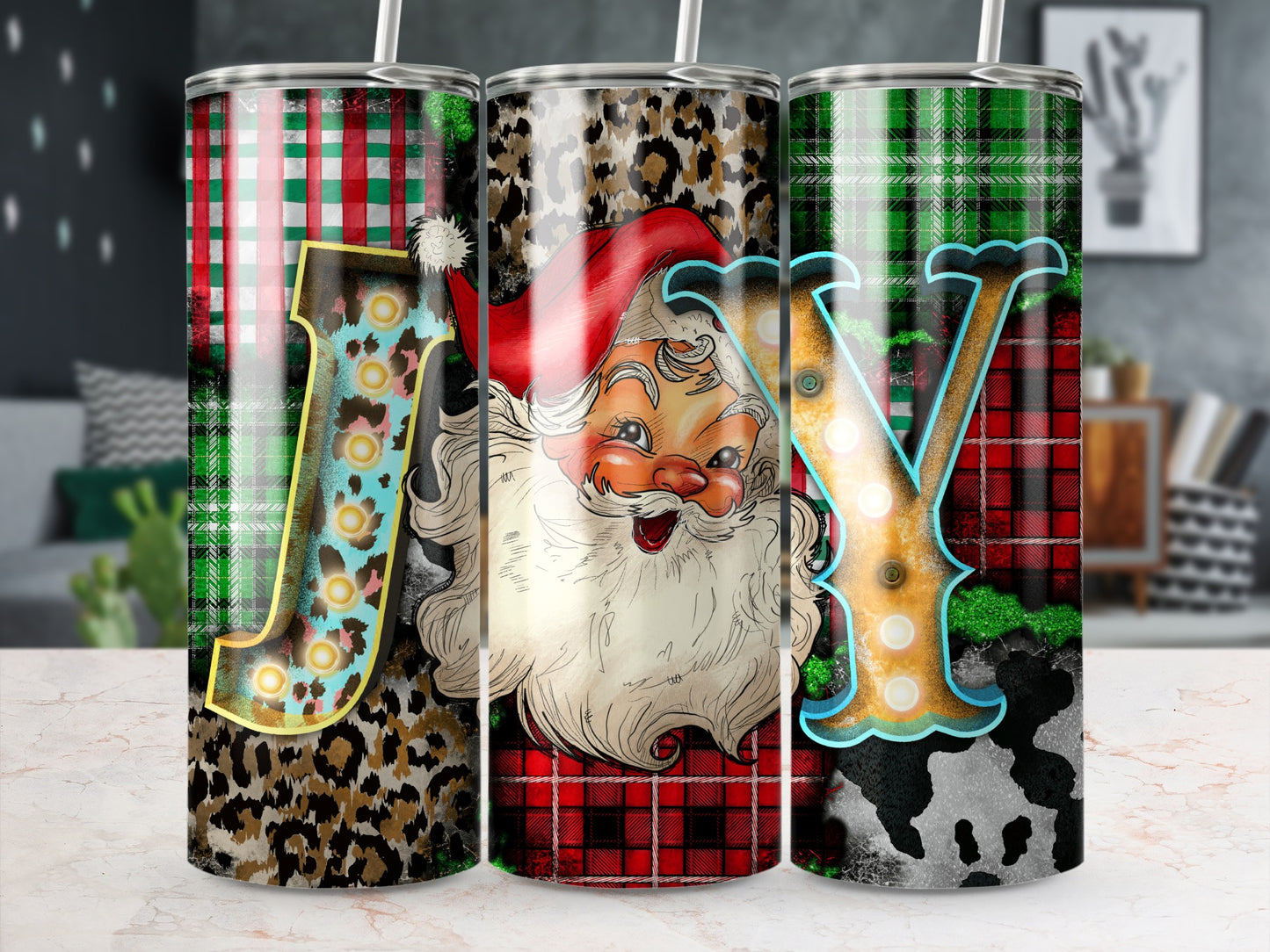 Santa Claus and plaid pattern with "JOY" text on a tumbler.