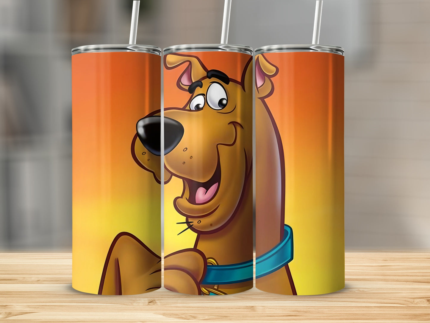 Scooby-Doo wearing a blue collar on a sunset gradient tumbler.