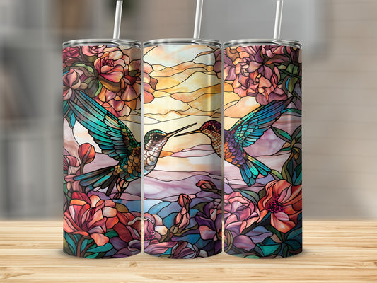 Three tumblers with stained glass hummingbirds and floral designs.