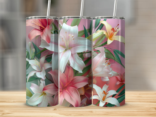 Three tall tumblers featuring pink and white lilies on a wooden surface.