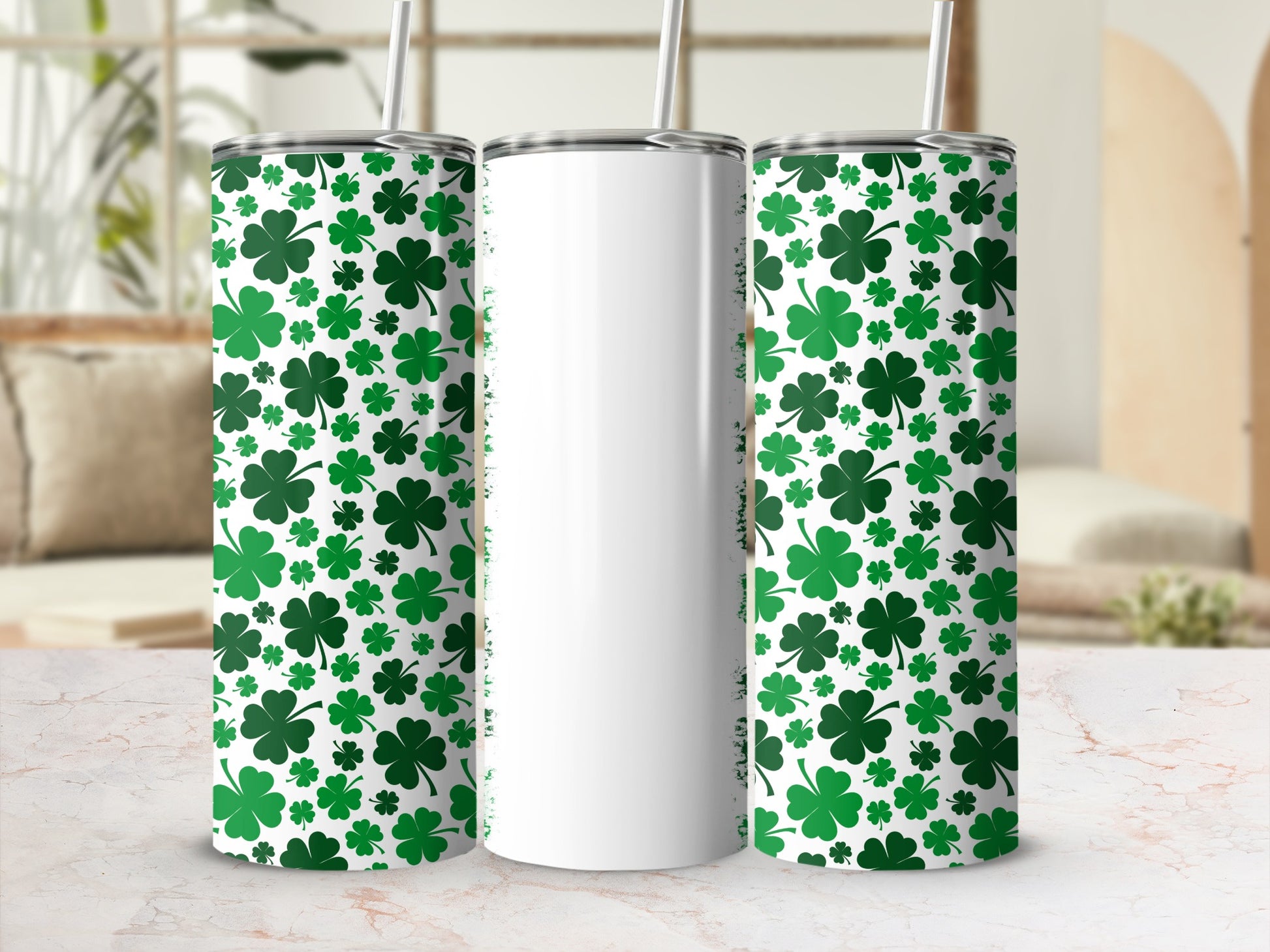 Green shamrock pattern on two tumblers, one white tumbler.