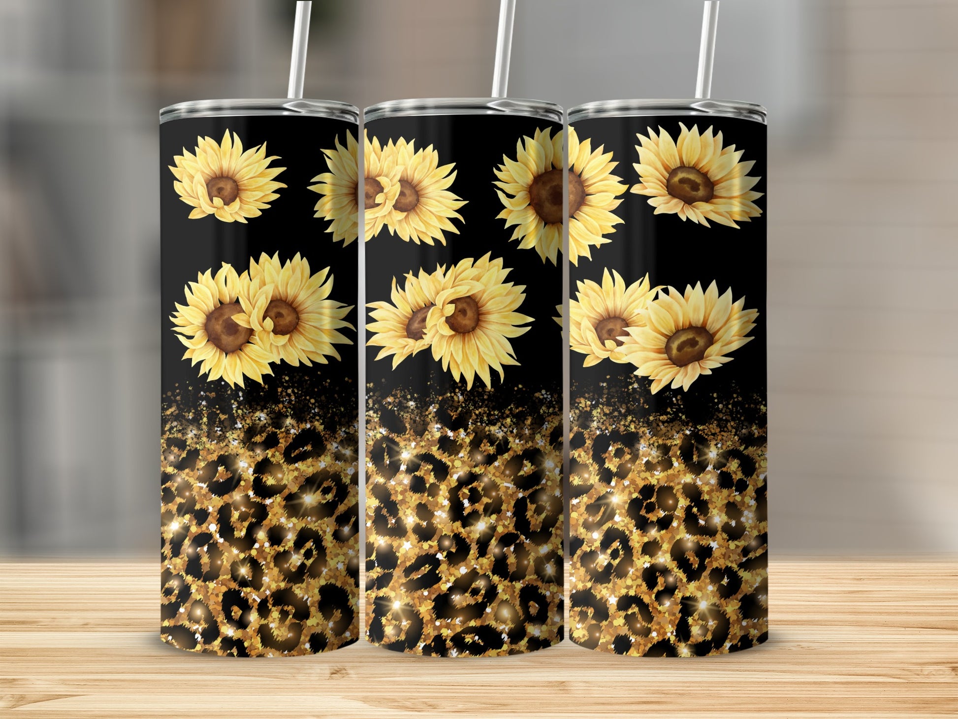 Three tumblers with sunflowers and leopard print design.