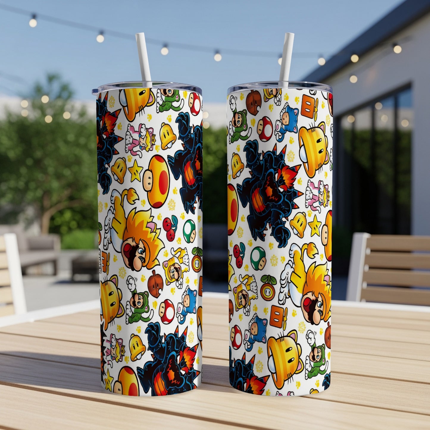 Two tall tumblers with cartoon characters and mushroom patterns.