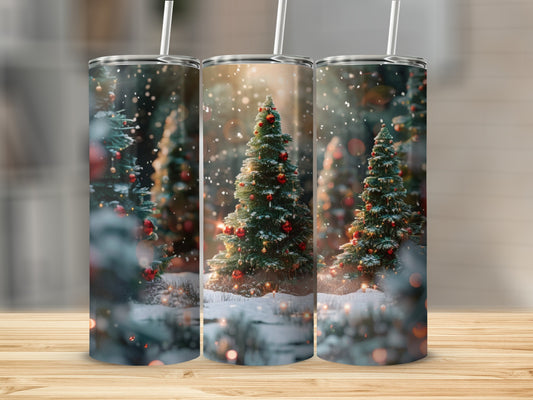 Three tumblers with a snowy Christmas tree scene and bokeh lights.