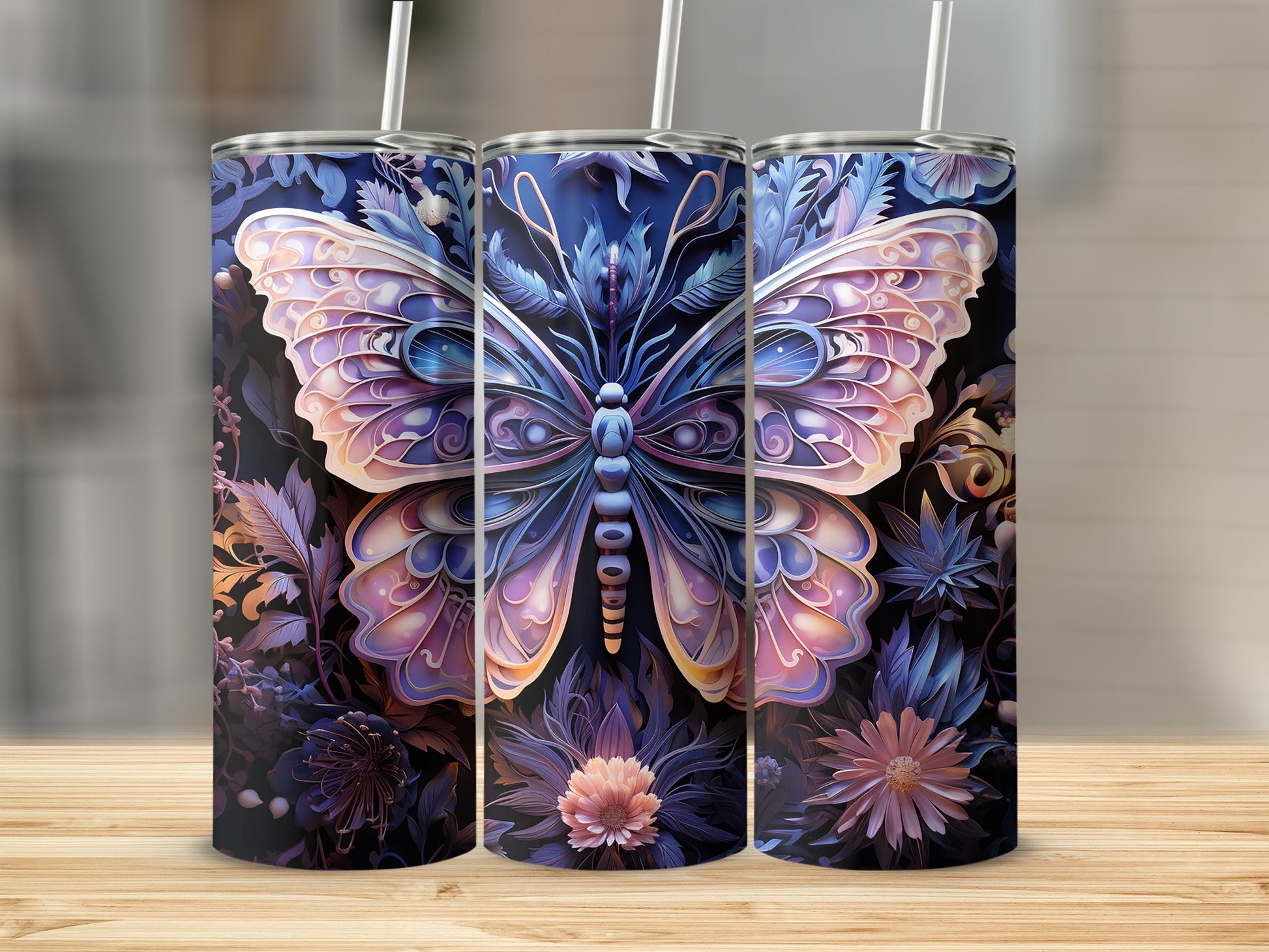 Three tumblers featuring a colorful butterfly and floral design.