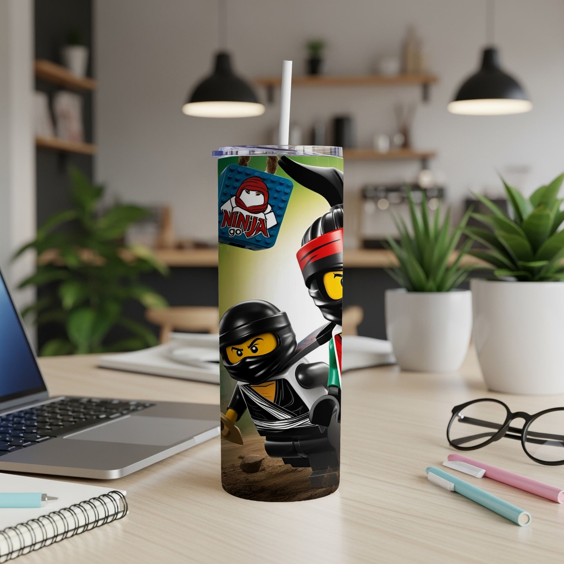 Two Ninjago characters with "GO NINJA GO!" text on a tumbler.