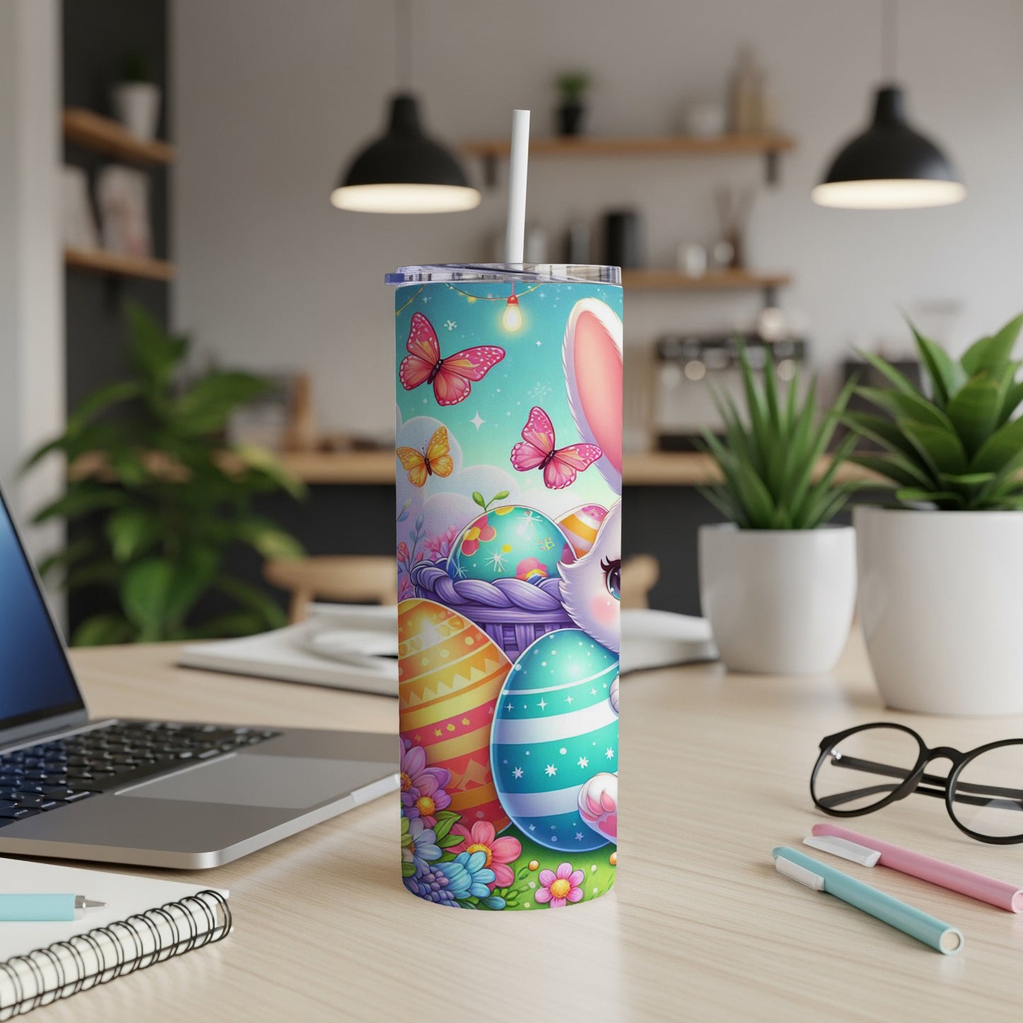 Easter bunny and painted eggs on a tumbler with butterflies and flowers.