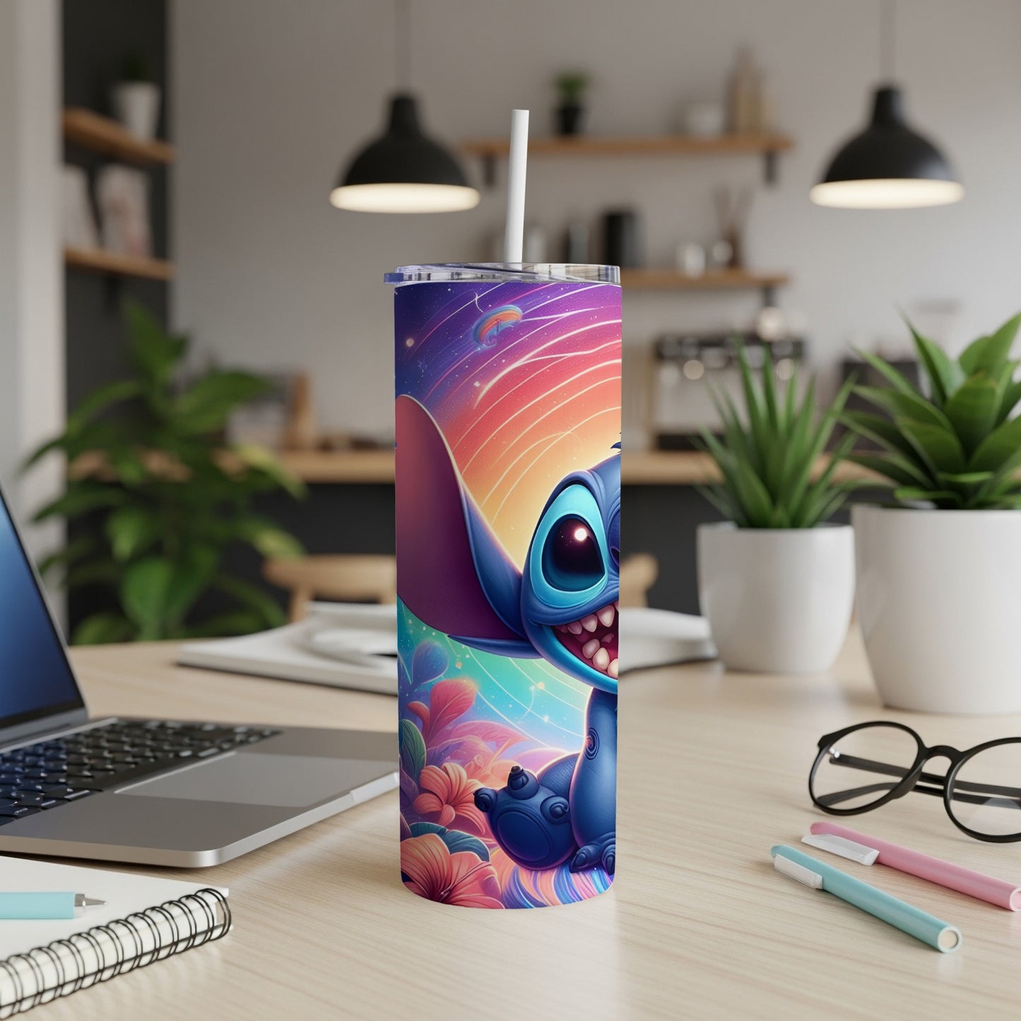 Stitch character on a colorful, floral patterned tumbler with a straw.