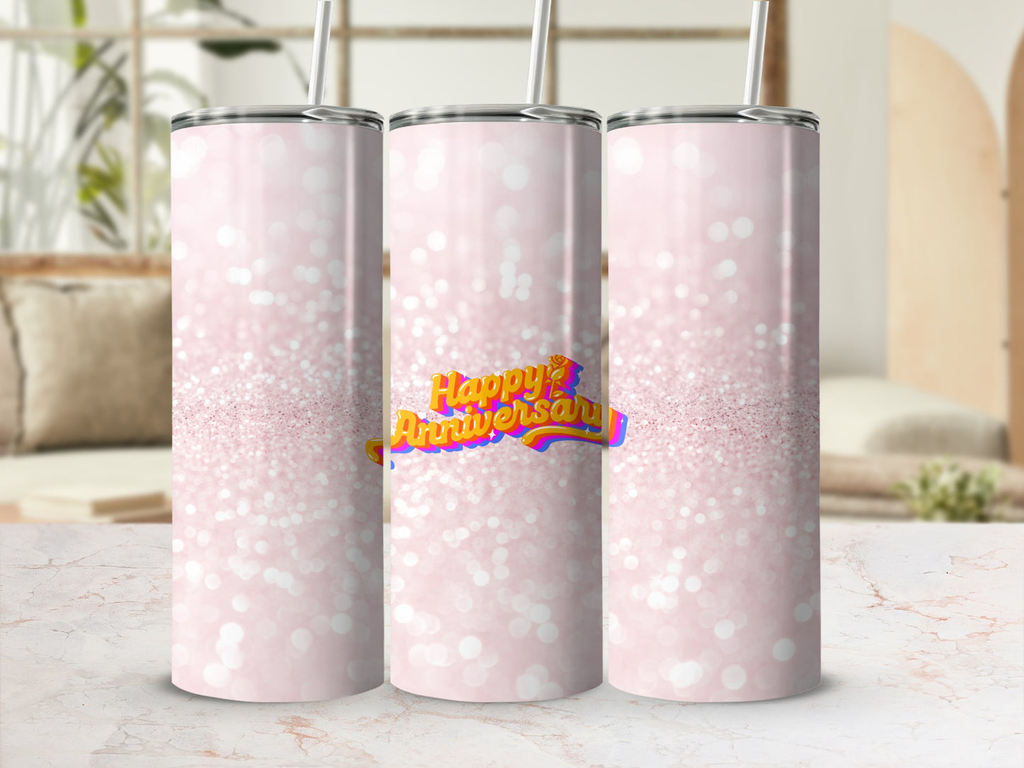 Pink glitter tumbler with "Happy Anniversary" text in colorful lettering.