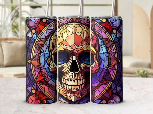 Three tumblers featuring a stained-glass skull design on a marbled surface.