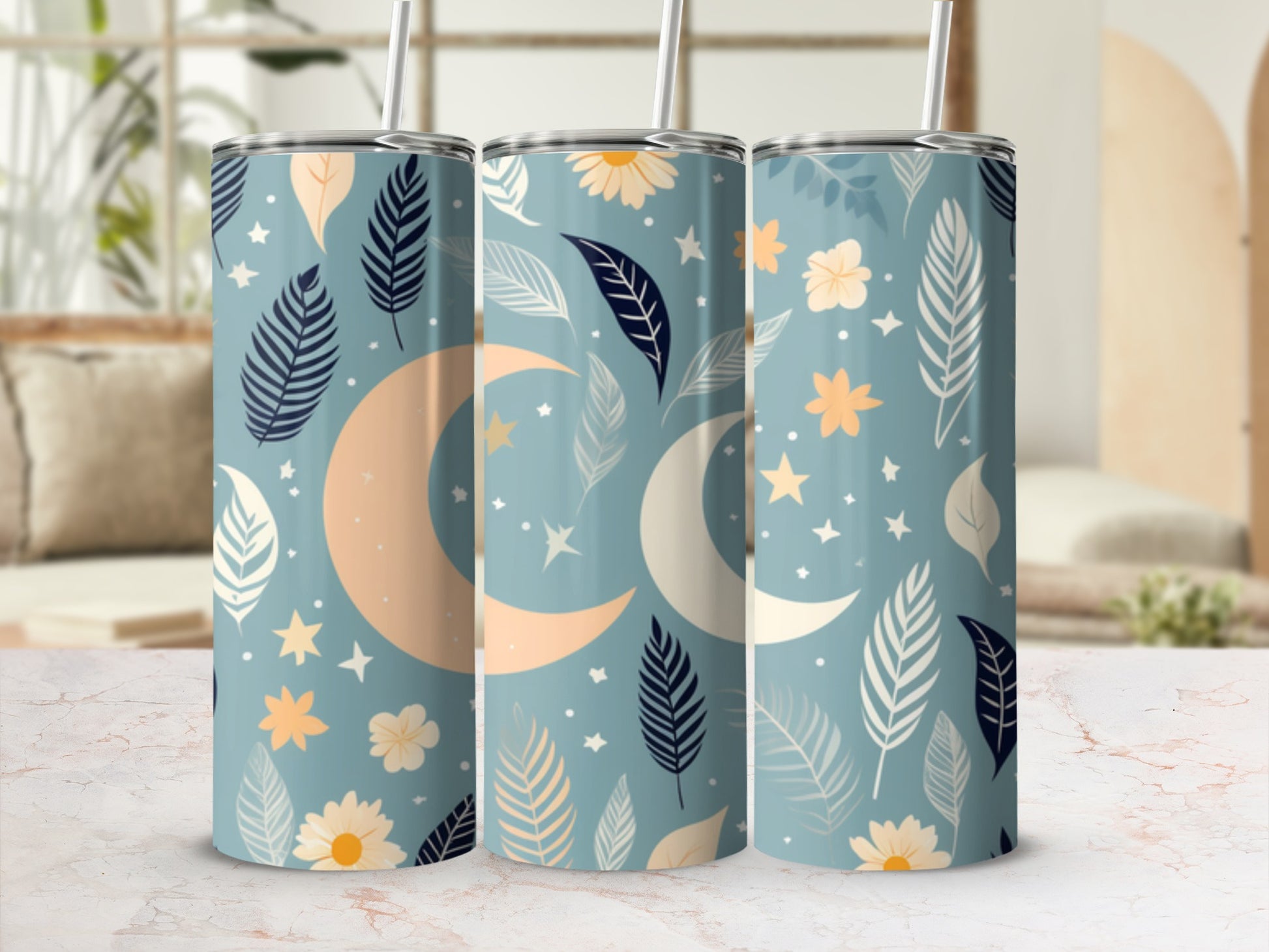 Three tumblers featuring a celestial moon and floral leaf pattern.