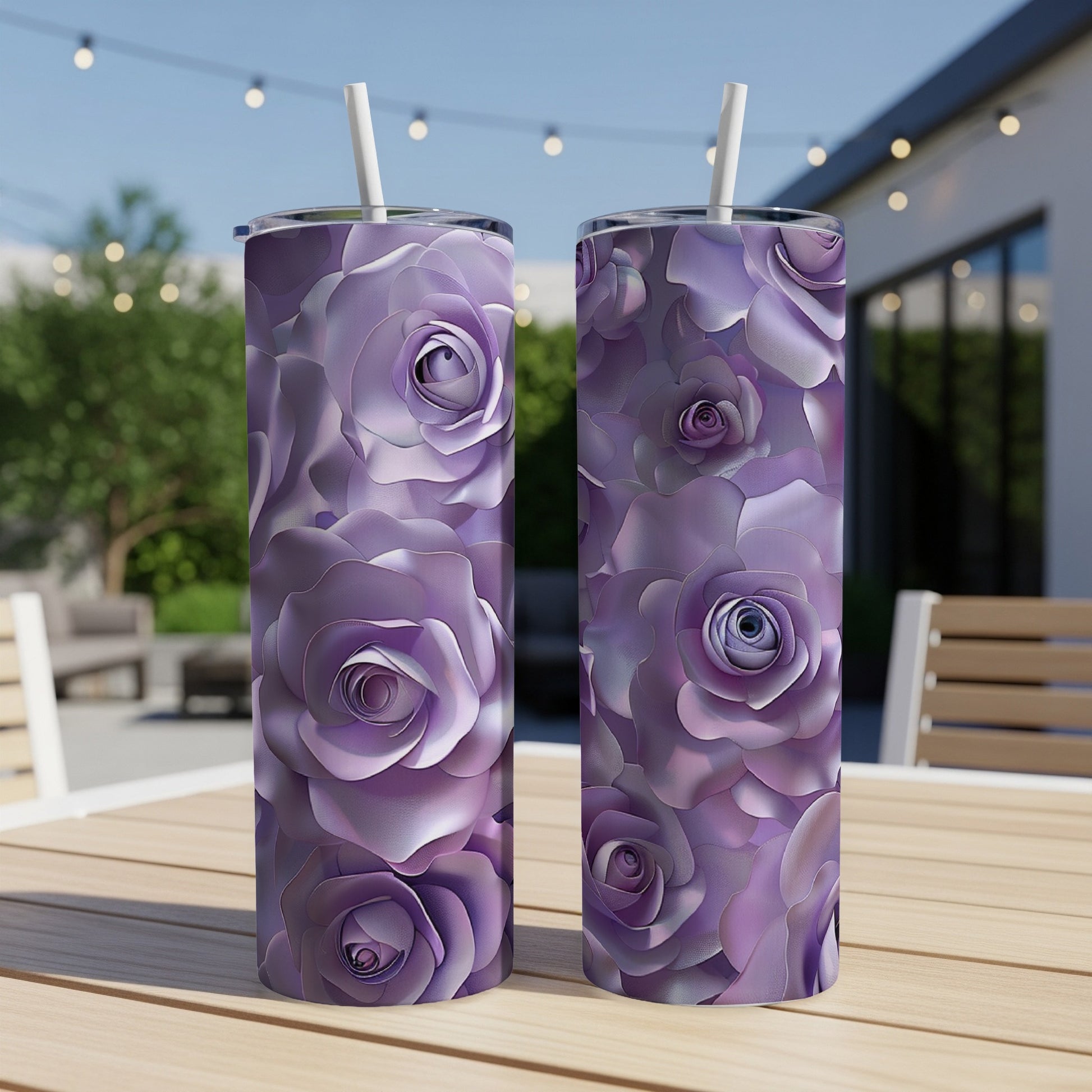 Two purple rose tumblers with straws on a wooden table.