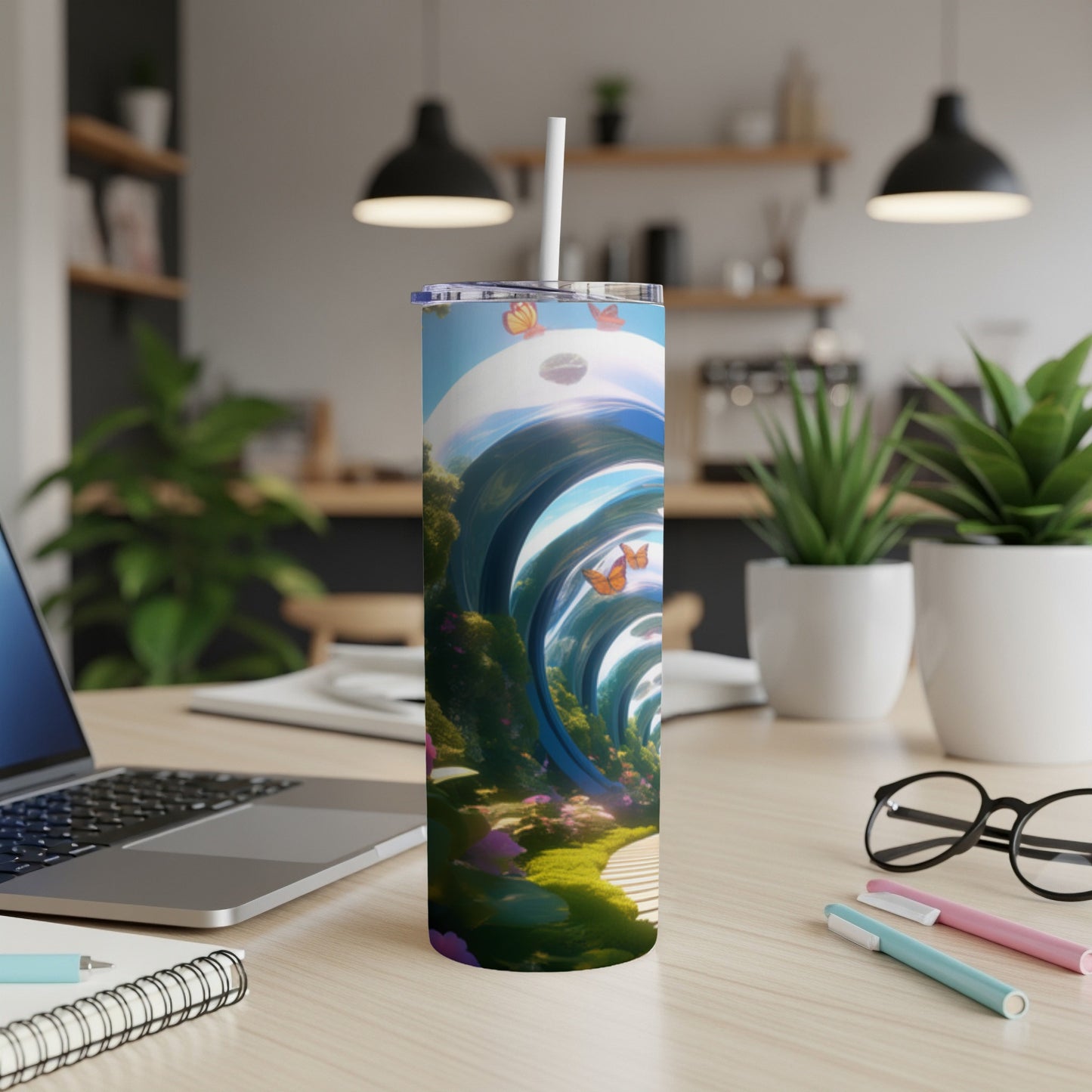 Tumbler with surreal nature scene featuring butterflies and a winding path.