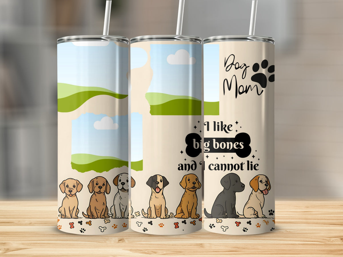 Tumbler with "Dog Mom" text and cartoon puppies, bones, and paw prints.