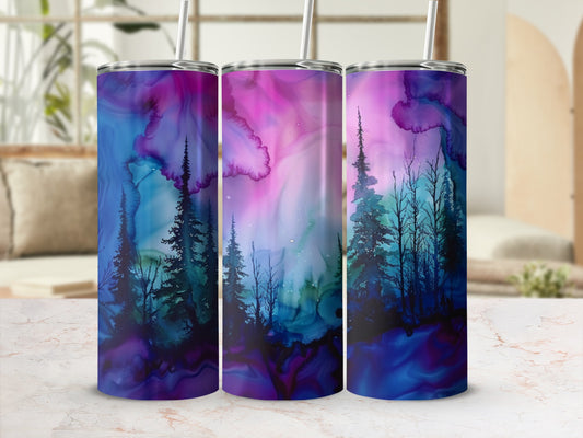 Three tumblers with a dark forest and colorful sky design.