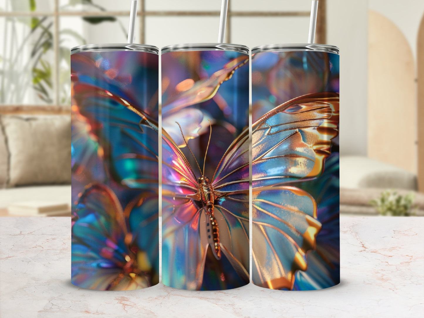 Three tumblers with iridescent butterfly wings design, displayed on a marble surface.