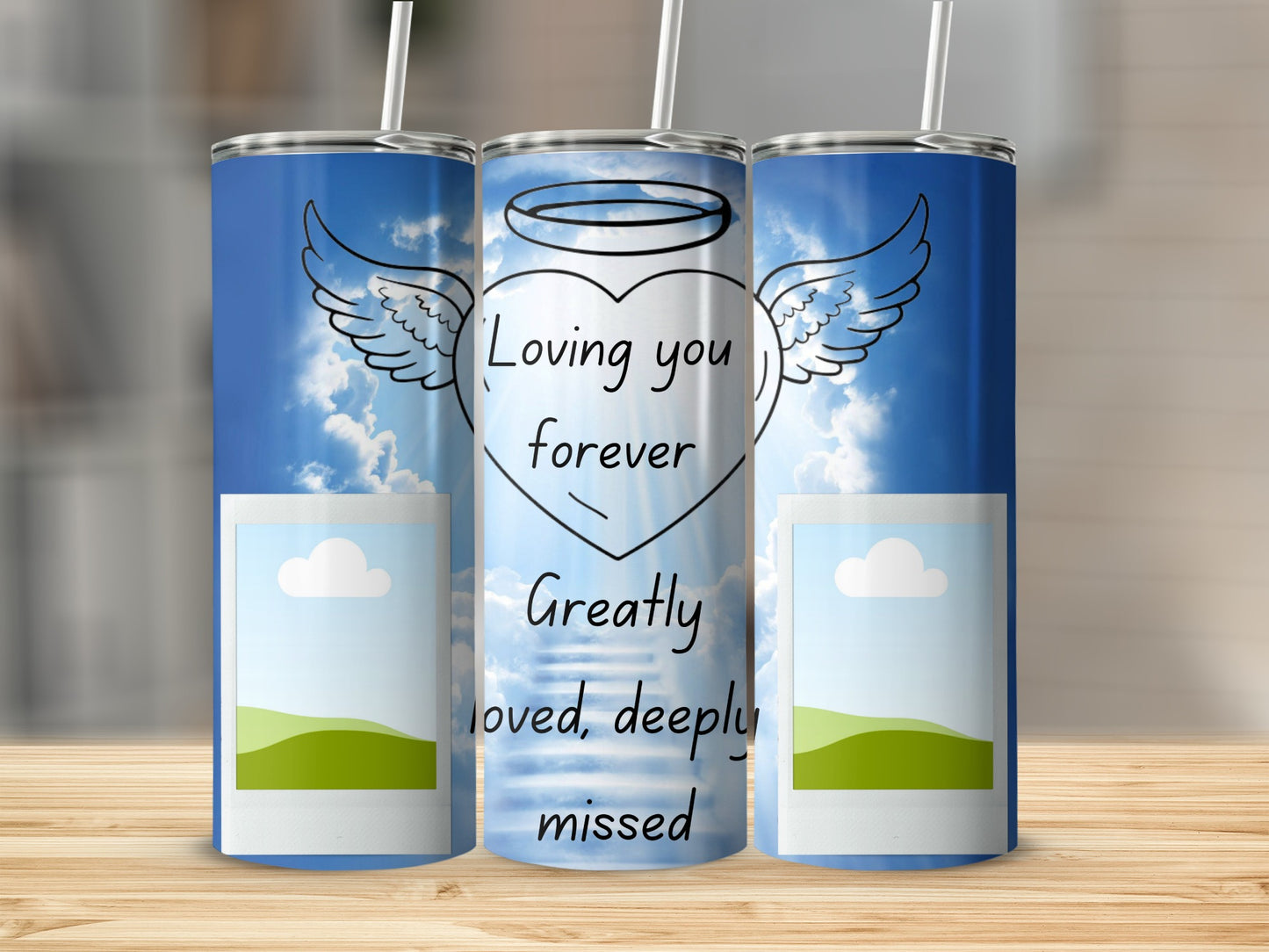 Tumbler with angel wings, heart, and text "Loving you forever" and "Greatly loved, deeply missed".