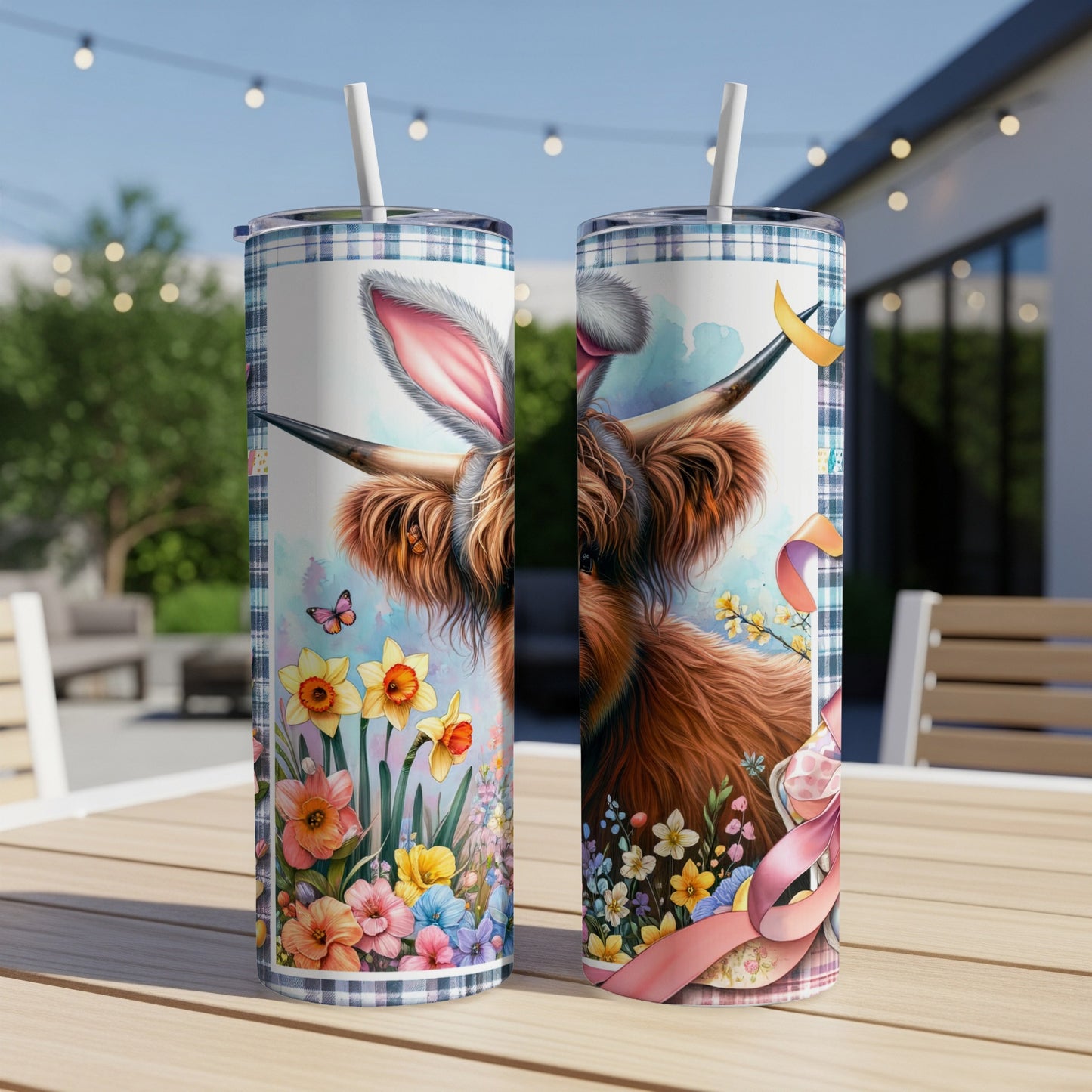 Highland cow with Easter bunny ears and floral decorations on a tumbler.