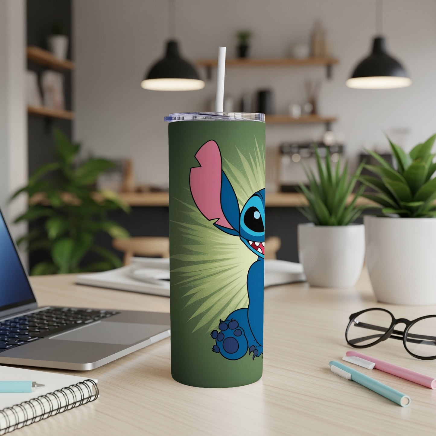 Blue Stitch character on a green tumbler with a straw.