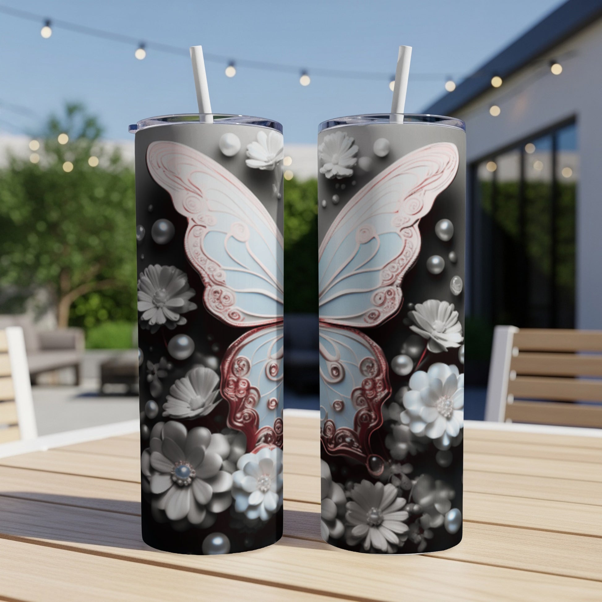 Two tumblers with a light blue butterfly and floral design.